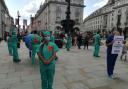 PLANET MEDICS: Activists 'resuscitate' a model planet in Piccadilly