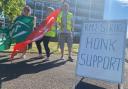 Strikers gathered outside Worcester Shrub Hill station on Tuesday as the industrial action began