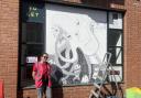 Helen Haynes with her mural during last year's festival