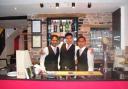 SADNESS: Monwar Khandokas (centre), manager at Ashleys, pictured in 2011 and, for many, the face of the business