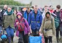 Festivalgoers brave the wet conditions at a previous Glastonbury Festival.