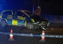 Police car following a crash on Elm Road, Evesham, in January 2022