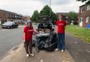 ACTION: Jill Desayrah (left) and Jack Walker fill her car with rubbish during a Warndon litter pick