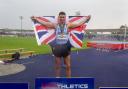 Joel Clarke-Khan celebrates winning a third British high jump title in Manchester