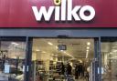 BUSY: Workers are beginning to stock the shelve in the former Wilko building.