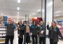 Barbra Frizzell, store manager (centre) along with former Wilko staff at Poundland opening.