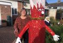 Tina Rimell with her scarecrow called Jack the Christmas Cracker.