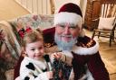 Father Christmas, played by Carl Sampson, visits the youngsters
