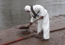 CLEANING UP: Crews from Worcester City Council are cleaning along the river Severn after recent flooding.