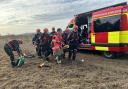 A woman was recused after being trapped in mud in Kempsey