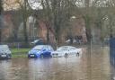 FLOODED: Pitchcroft car park where flood water creeps up towards cars