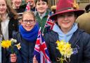 Kate Woodford and Iliza Morrisgave the Queen flowers hand picked from their garden.
