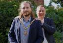 Cllr George Duffy (left), chairman of Wychavon District Council being passed over the chain by his predecessor, Cllr Robert Raphael (right)