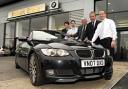 Colin Sutton, Richard Hunt, Roger Hunt, David Preece and Adrian Reed admire a BMW 35i convertible at the Robert Stern dealership in Worcester. The car will be at tomorrow's show. Picture by Martin Humby. 20035901