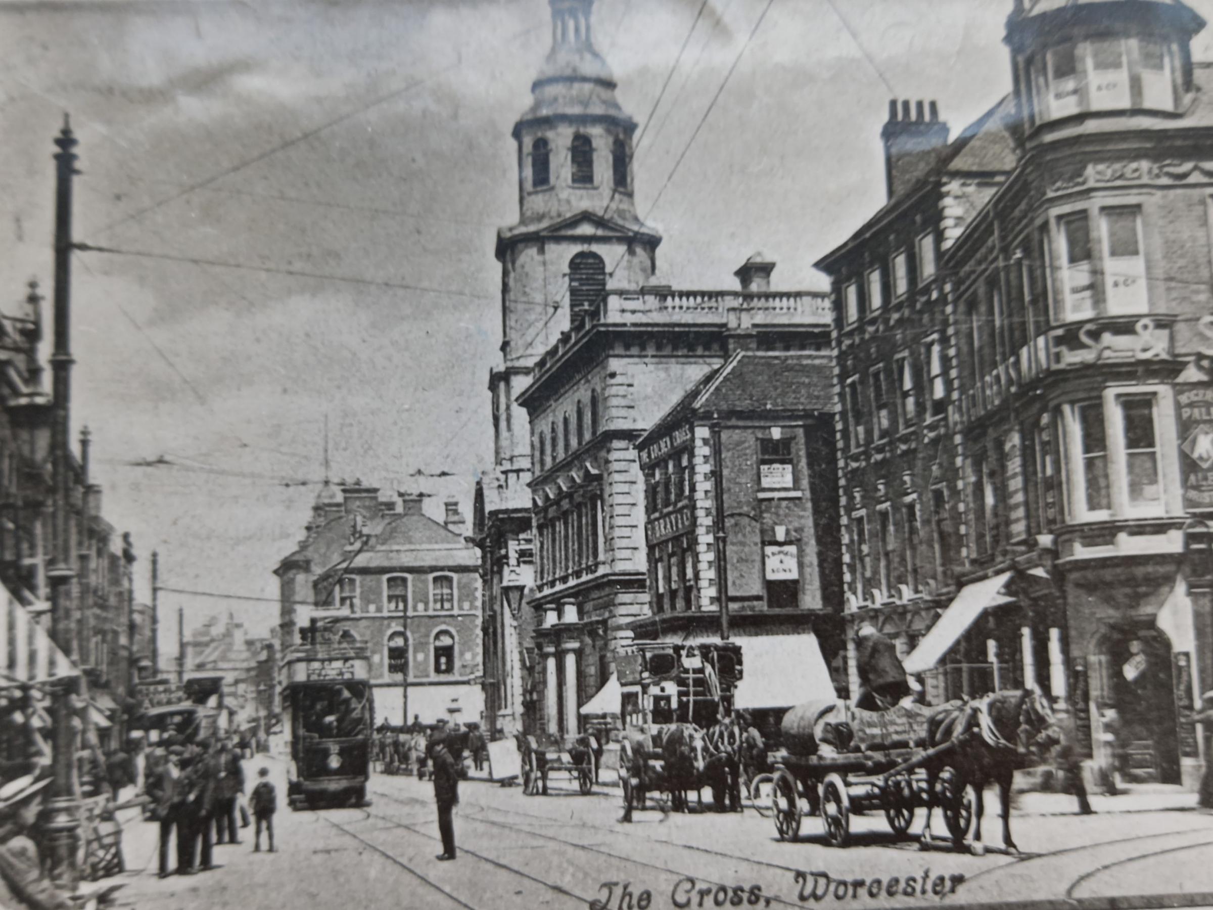 Worcester Cross in the early 1900s. No sign of witches, but the tram lines had just been laid