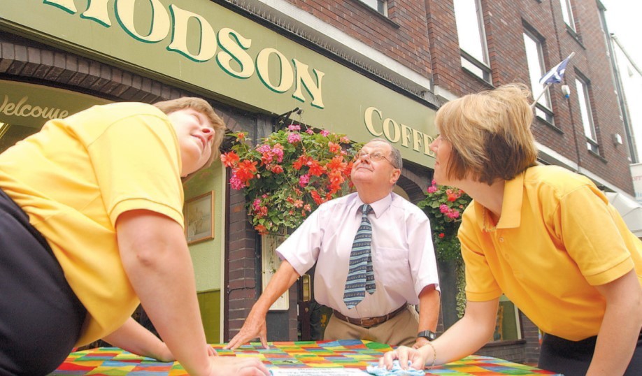 September 2002 and : Sarah Alldrett (left), John Machin and Corinne Turnnidge wipe up the pigeon mess outside Hodson’s Coffee Shop and Restaurant in the High Street. The eaterie eventually had to remove its pavement chairs and tables because so