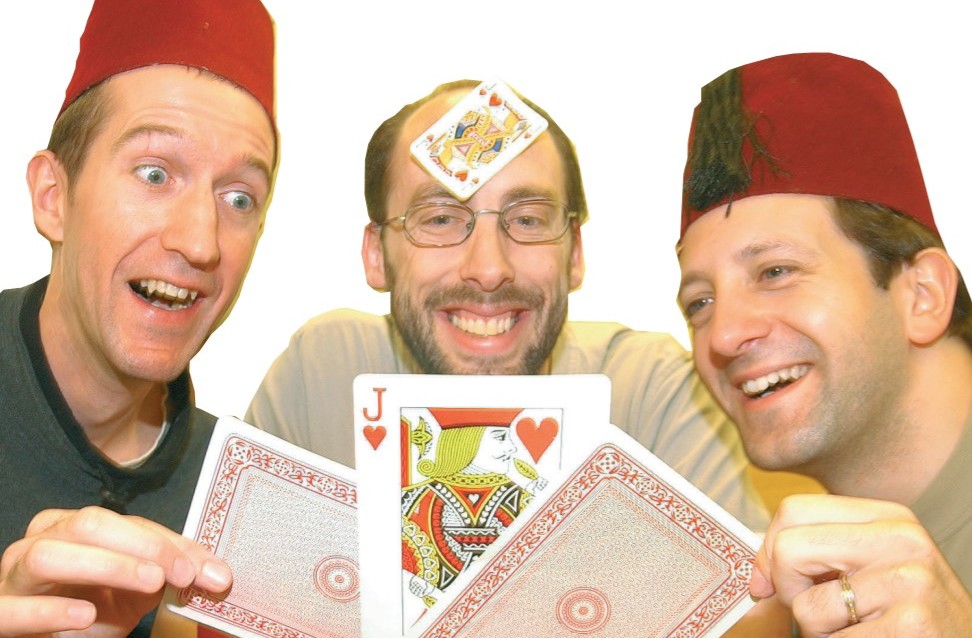 Magical supervisor Peter Clifford with actors Simon Grover (left) and Robin Simpson in September 2002 