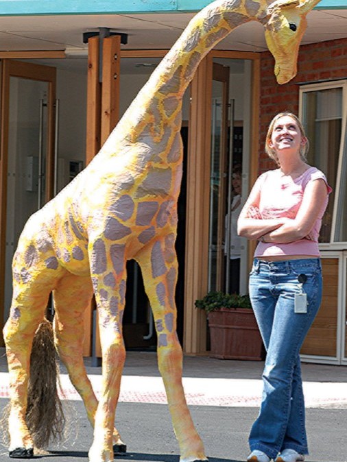 Acorns staff nurse Vicky White welcomes one of the hospice’s most unusual donations in September 2005 – a model of a baby giraffe. Named Sweety, it was made by Michael Woods, a former prisoner at Hewell Grange prison