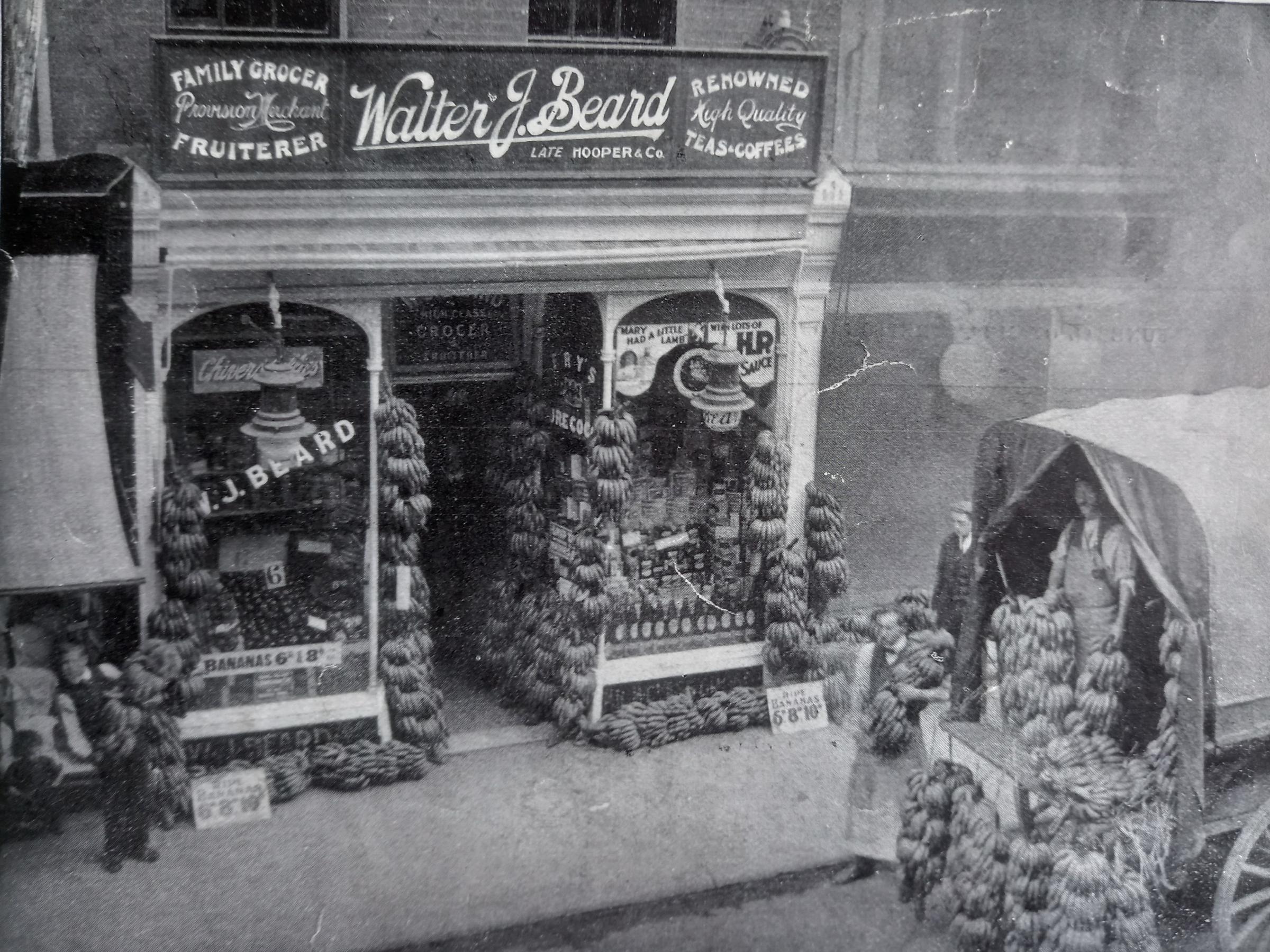 Beards Stores in Broad Street always laid on a superb display of hops and cheeses for the autumn fair, although here the focus is on a newly arrived  batch of “green bananas”, then still a novelty