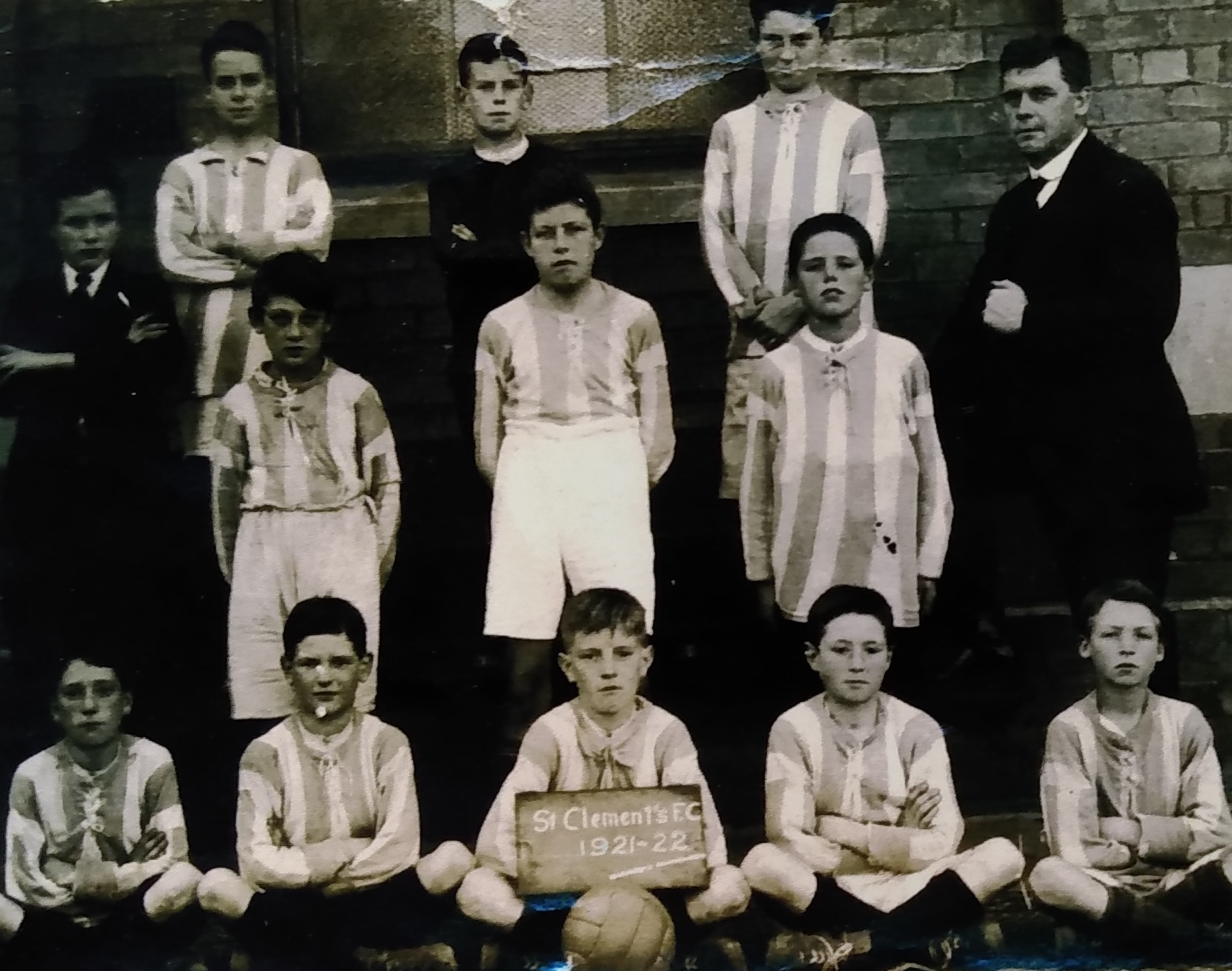 St Clements FC, 1921-22 says the chalkboard in front of this stern-looking bunch of boys