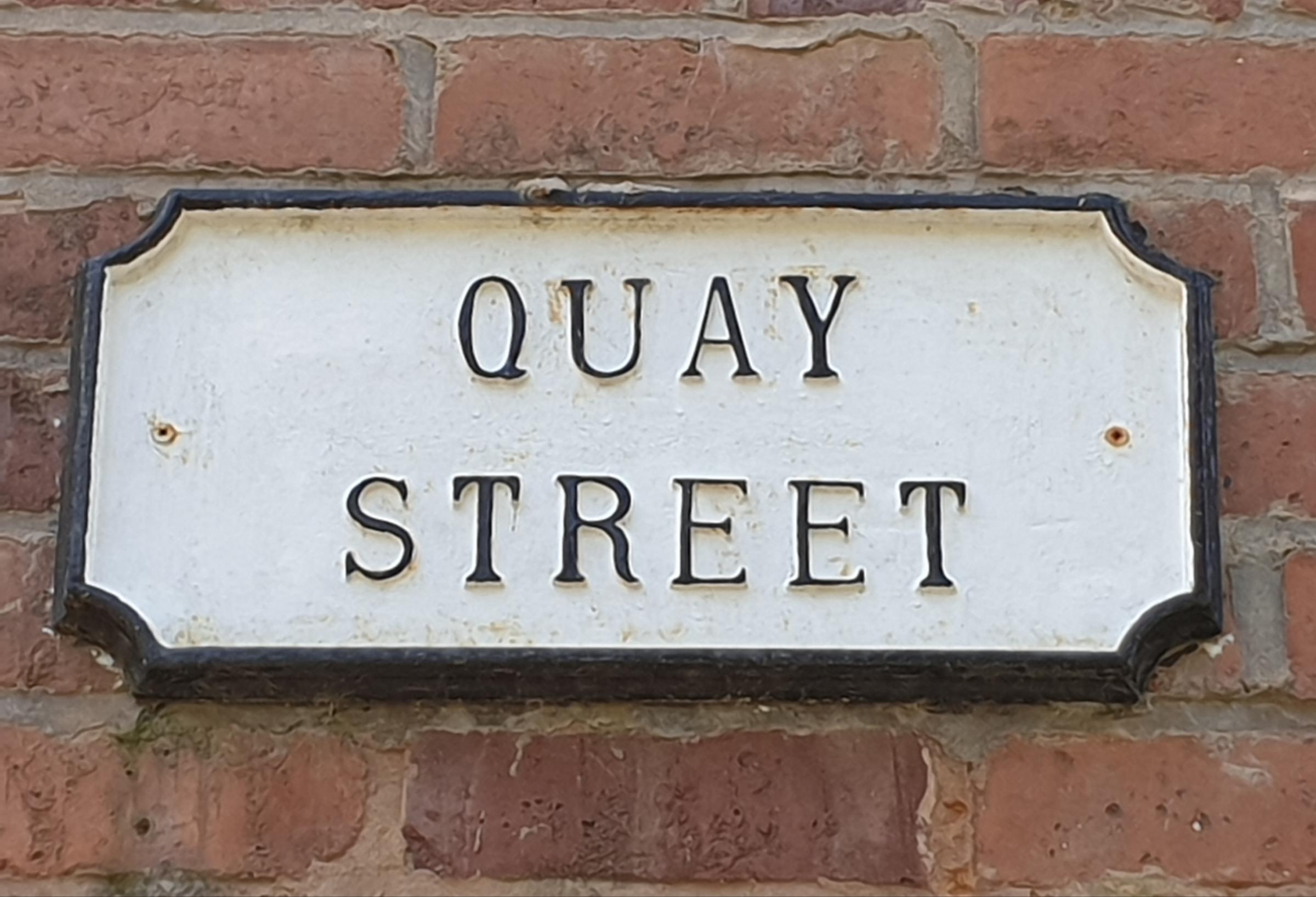 The Quay Street sign is a spruce affair these days