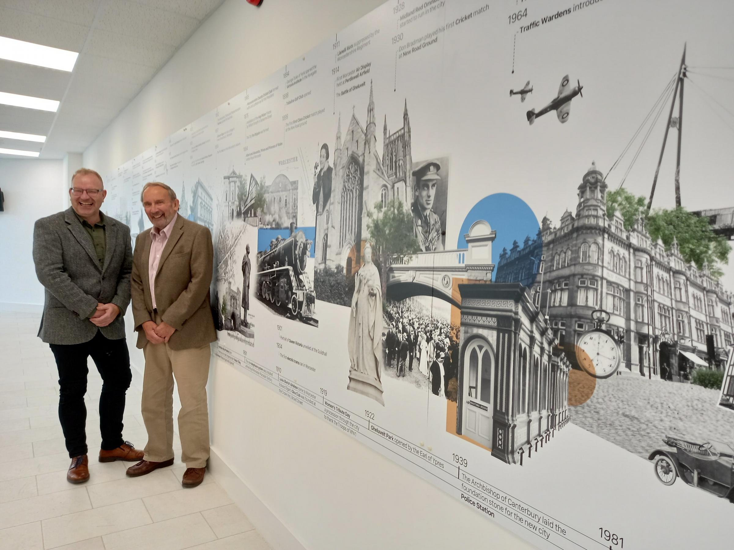 Mike Lloyd, Crowngate manager (left), and Phil Douce, Worcester Civic Society chairman, with the 36ft long timeline of Worcester through the ages
