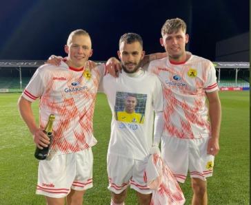 FOR LEON: goal scorers Joe Billingham (left) and Rich Smith (right) either side of Isaac Cooper, who dedicated win to his friend Leon Taylor who died last week.