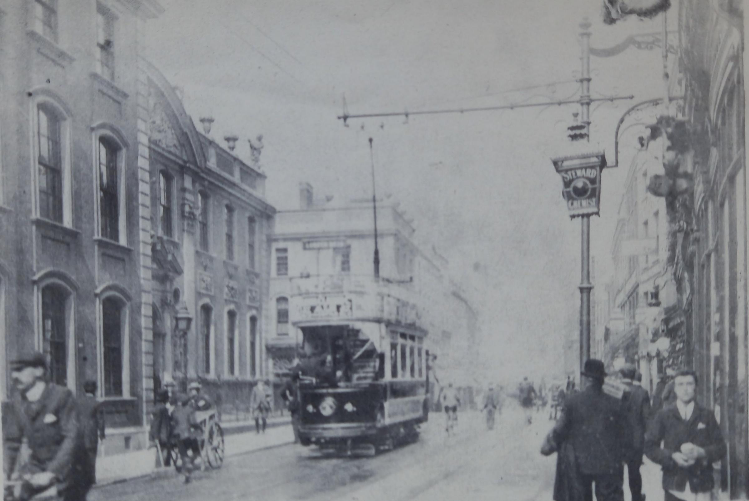 The Guildhall and High Street in 1904, when electric trams had just arrived. Inset, Worcester Guildhall, where election results have traditionally been announced, decked in bunting and flowers in 1902 to celebrate the end of the Boer War