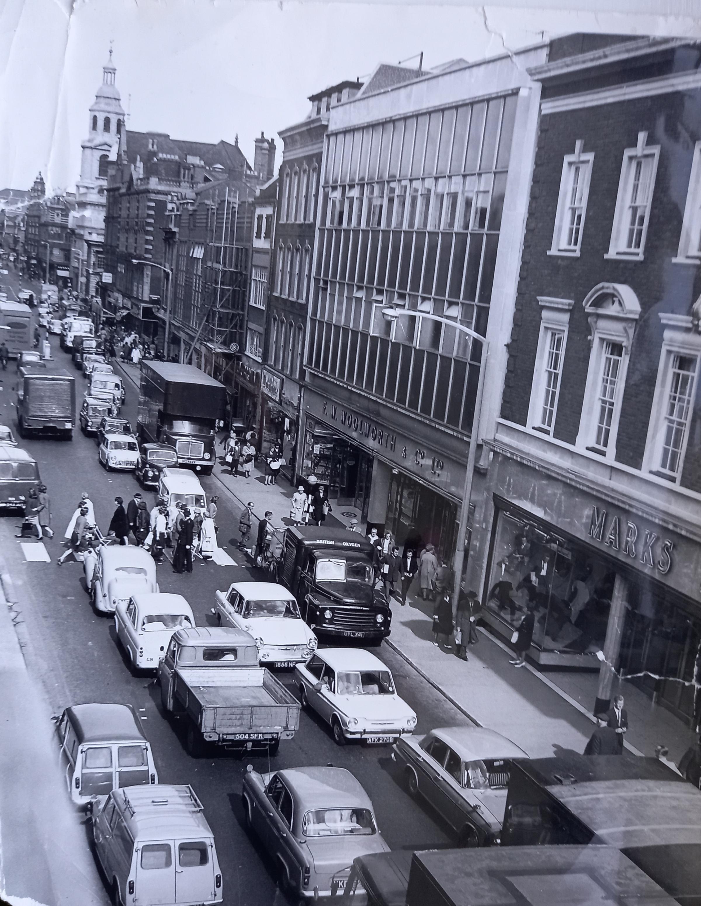 Worcester High Street in the 1960s with two way traffic, Marks and Sparks and Woolworths
