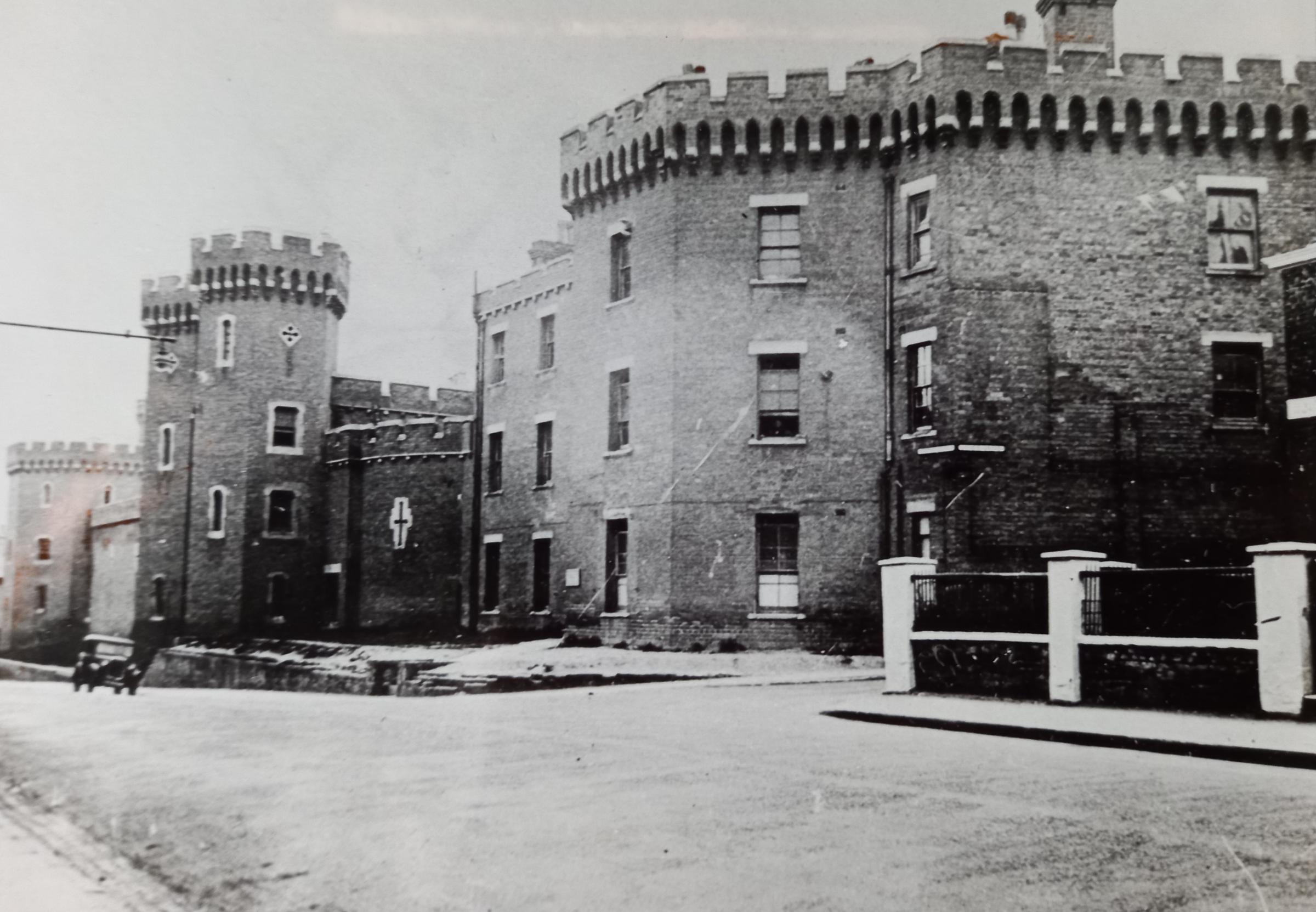 The Old Worcester County Gaol in Castle Street.  The facade was demolished and the H. A. Saunders garage was built, while in some of the old prison buildings the furniture company GT Rackstraws operated