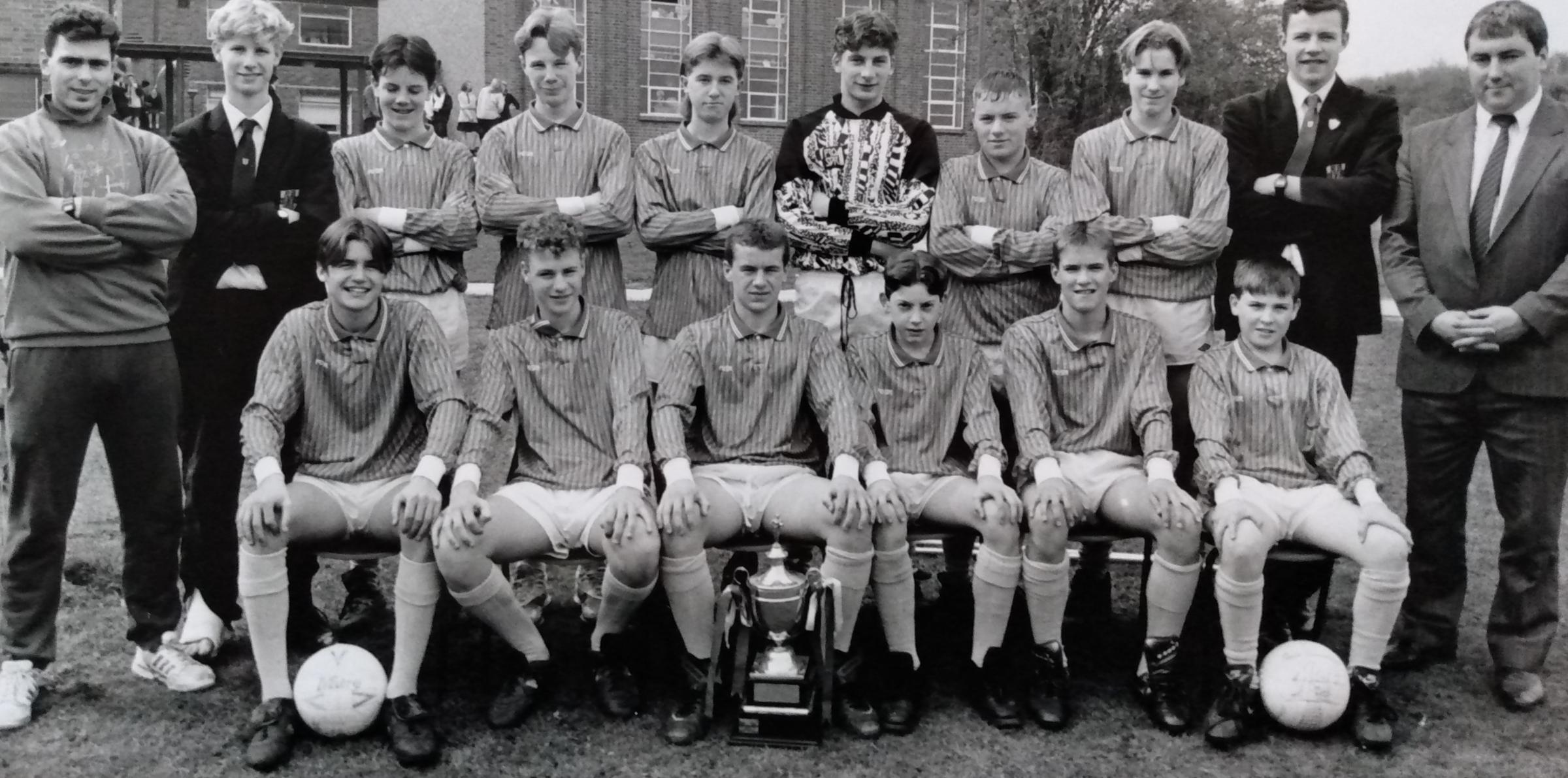 The school’s under-16s football team line up for the camera
