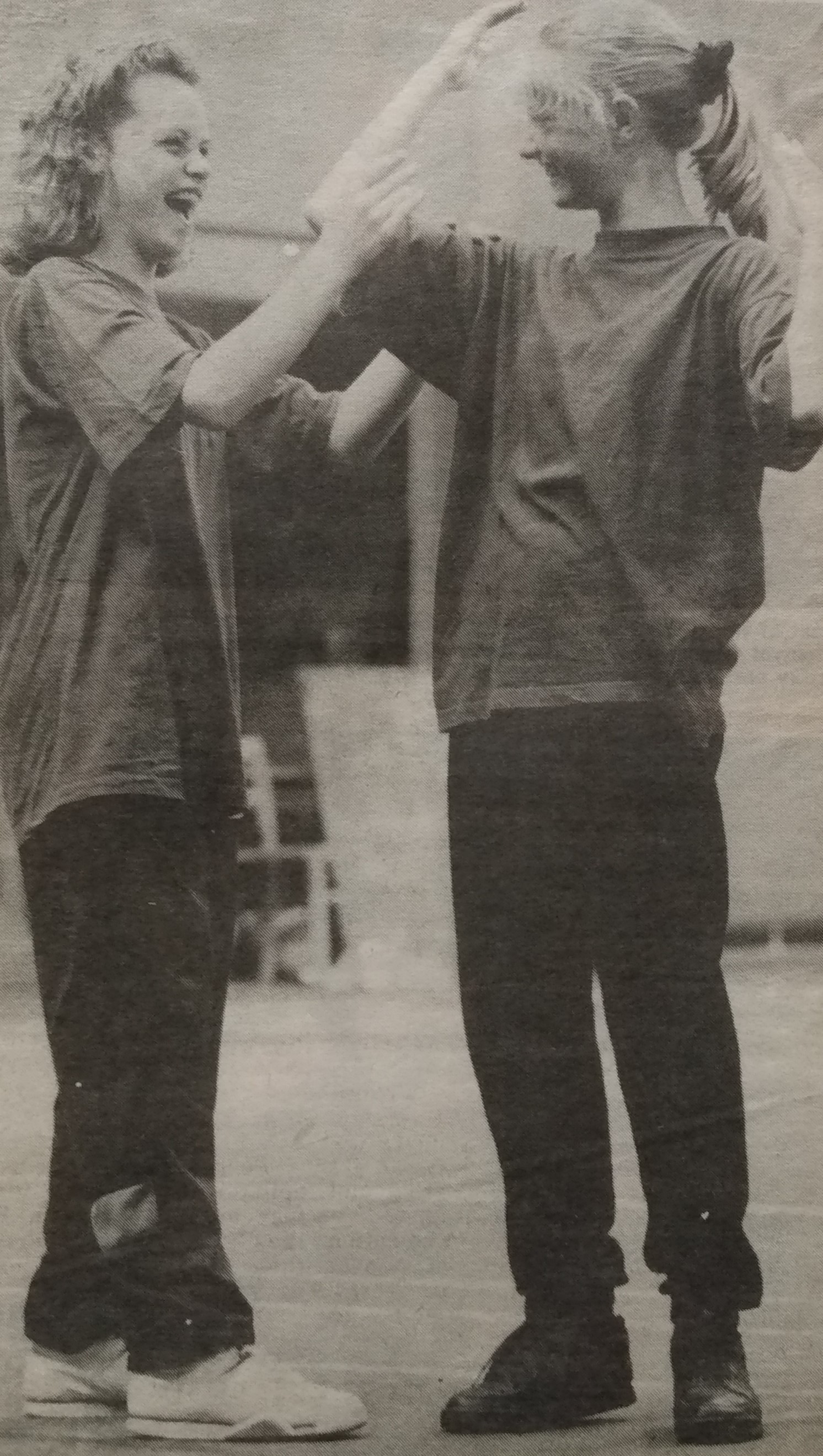 A circus workshop came to the school in July 1992. Kristy Askew and Lucy Walker try out some of the skills they picked up