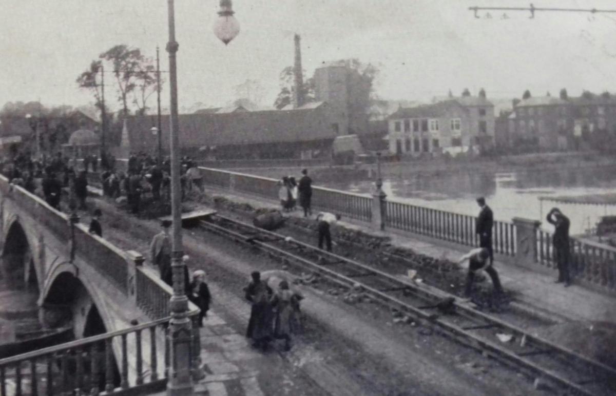 Laying the tracks for the electric trams across Worcester bridge in 1902