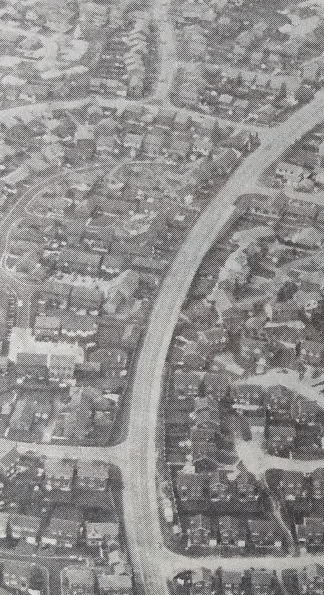 This birds-eye view taken by Roy Booker in 1989 show the recognisable line of St Peters Drive as it arcs westward towards the junstion with the Bath Road