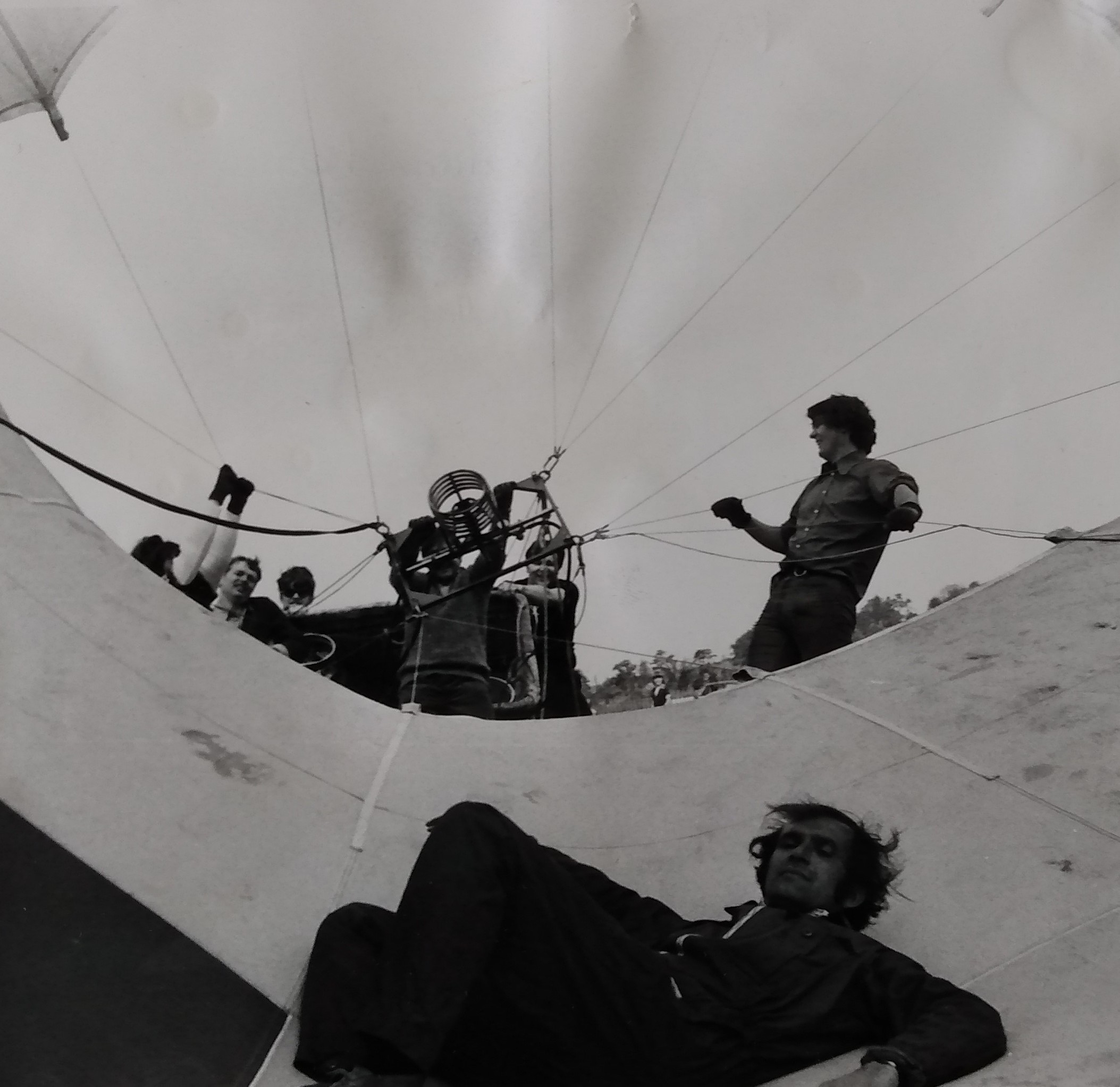 A literal interpratation of going for a ride in a balloon... Pilot Tom Sage takes a tumble before take-off from a windy showground at Perdiswell in May 1974