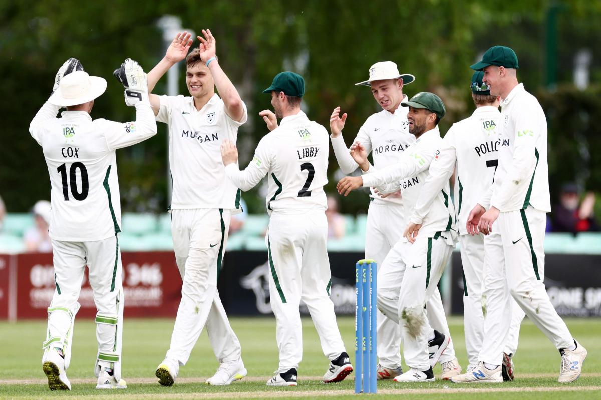 Ben Gibbon celebrates a first wicket for Worcestershire.