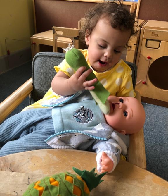 Worcester News: Miley Estefanous playing with a Bright Ears UK doll Worcester News: Miley Estefanous playing with a Bright Ears UK doll