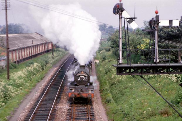 A rail nostalgia event is being held at Pershore Library. Photo shows the London Paddington-bound 'Cathedrals Express' about to pass under the road bridge at Pershore Station at speed in the summer of 1963. Picture: Michael Clemens