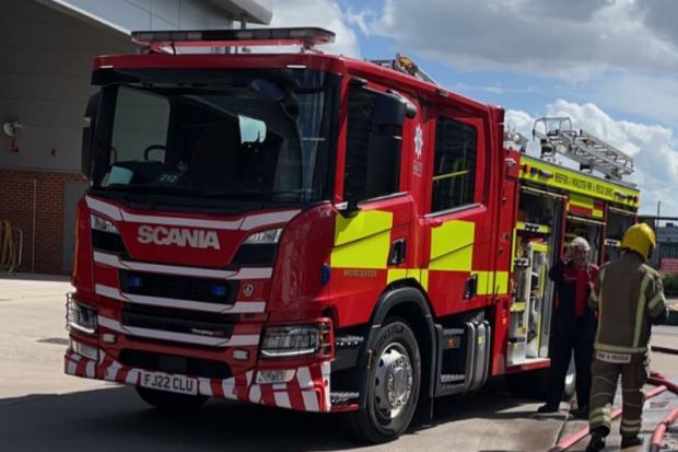 Firefighters rescued a person trapped in a car in Market's Gate, Pershore.