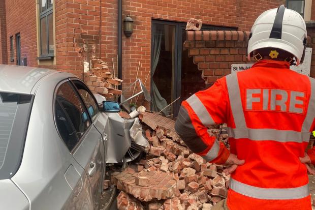Worcester News: Fire service had to give advice after the crash caused structural damage to the property