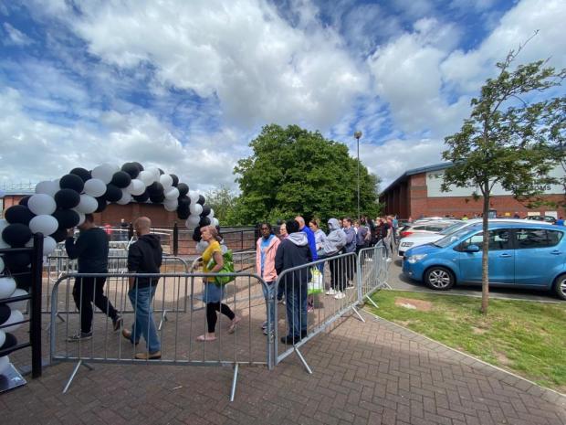 Worcester News: The queue at around 12:30pm on Saturday, an hour and a half after opening