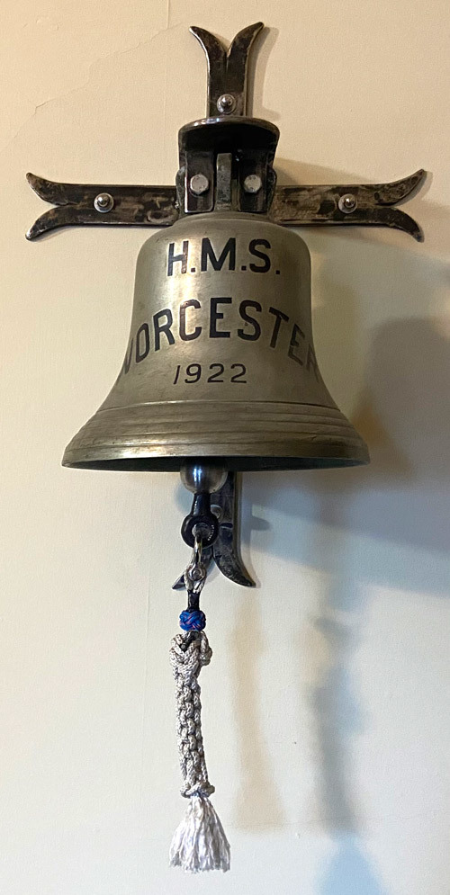 The ship’s bell bearing the date she was commissioned into service in the Royal Navy’s fleet. The bell hangs in the Randall room of the Guildhall