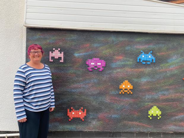 Worcester News: Rossalyn Peace, who lives in the area, said she loves the color the paintings bring to the street