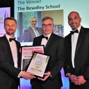 editor Michael Purton presents Bewdley School Headteacher Dave Hadley Pryce with the award at the Worcester News Worcestershire Education Awards 2019, held at the University of Worcester Arena. Pic Jonathan Barry 20.6.19.