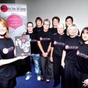 CAUSE: Susie Coleman, patron of the breast unit campaign, with the 2010 calendar and the models who took part. Picture by Paul Jackson.