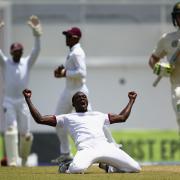 KINGSTON, JAMAICA - JUNE 12:  Jerome Taylor of West Indies celebrates after taking the wicket of Steve Smith of Australia LBW for 199 runs during day two of the Second Test match between Australia and the West Indies at Sabina Park on June 12, 2015 in
