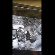 CCTV: Shows the thieves in the shop stealing the till drawer