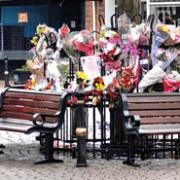 TRIBUTES: The growing pile of floral tributes left in Evesham's Market Square