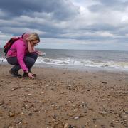 Collecting glass from the beach at Seaham in the north east of England.