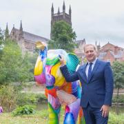 BIG PARADE: Councillor Marc Bayliss with Pears the elephant